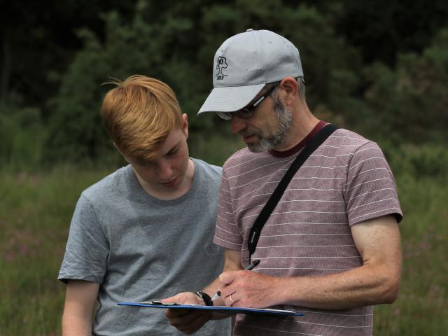 Volunteer Harry with Ian Middlebrook on Stoborough Heath - Peter Moore